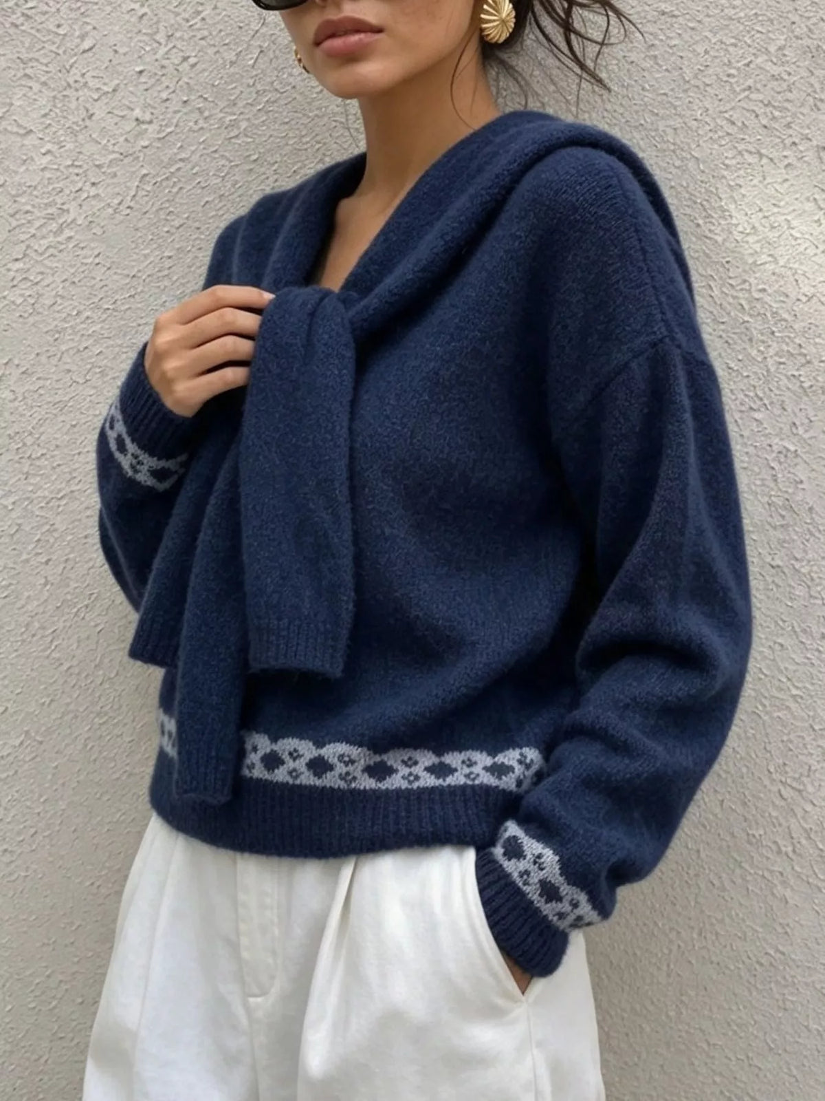 Navy scarf-detail dropped-shoulder sweater, angled front view.
