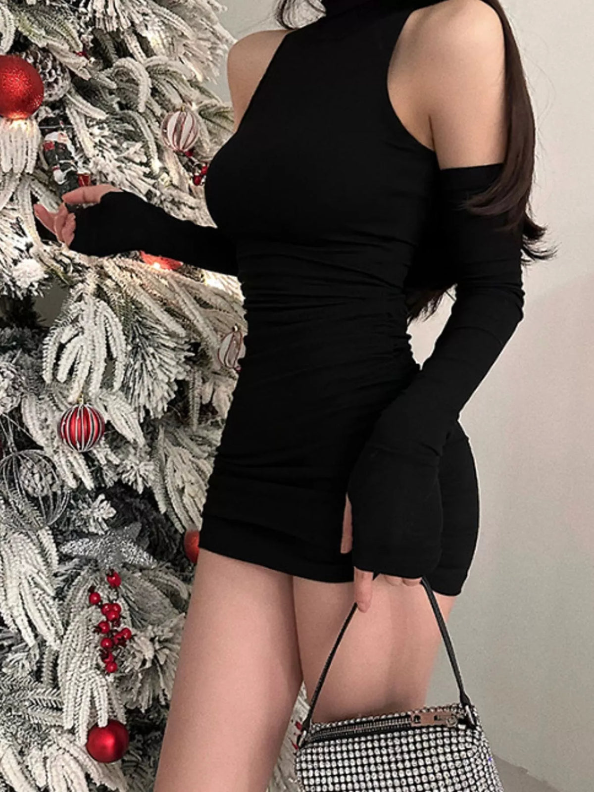 Turtleneck sleeveless mini dress, front view on model