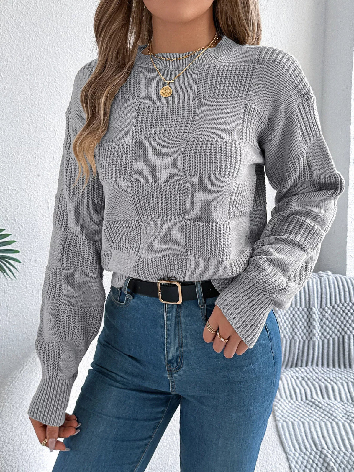 Gray checkerboard textured knit sweater
