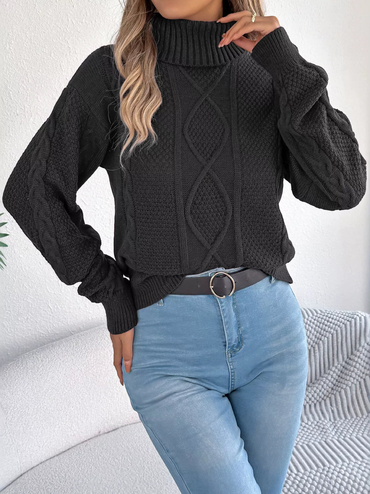 Black turtleneck cable knit sweater