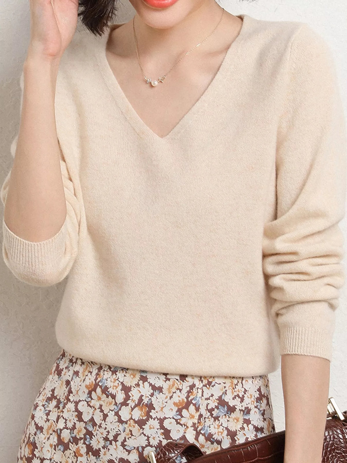 Beige v-neck long sleeve knit top