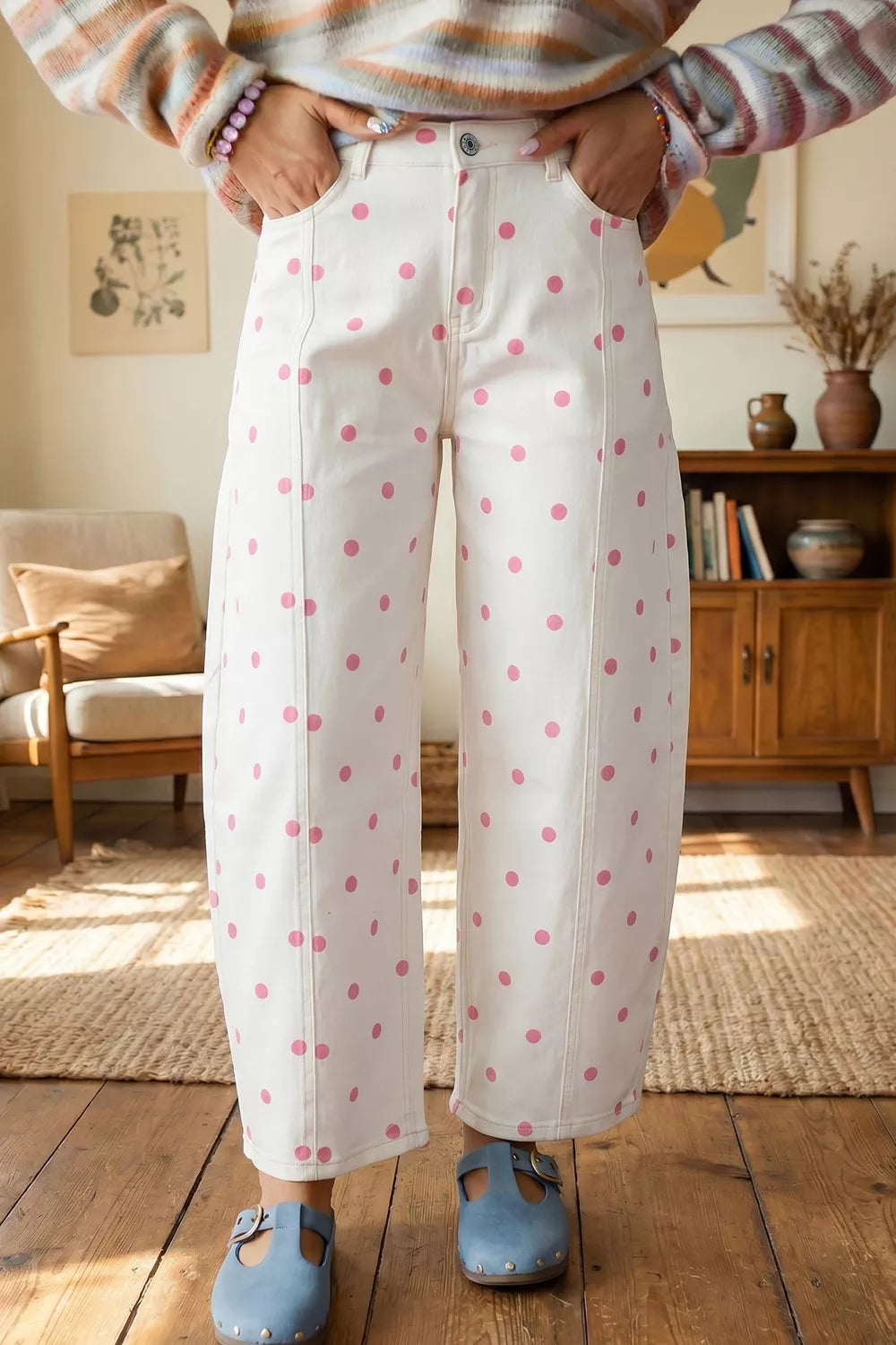 White with pink dots polka-dot cropped jeans, front view with hands at waist