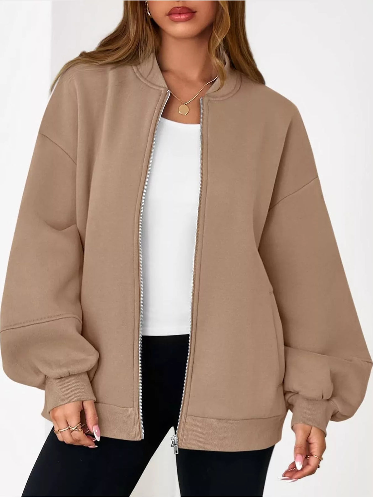 Tan oversized zip-up jacket — front view