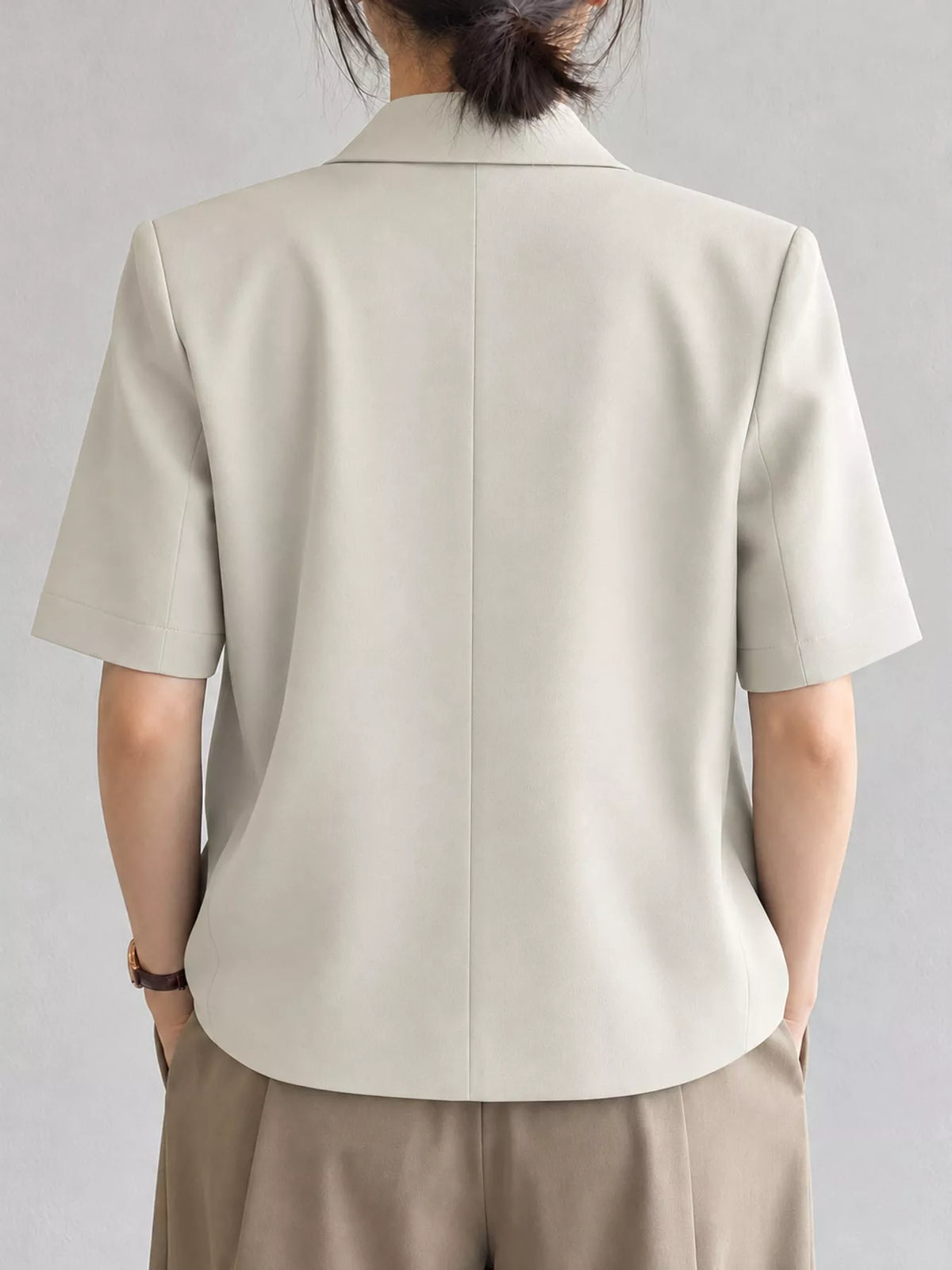 Collared short sleeve blazer, back view