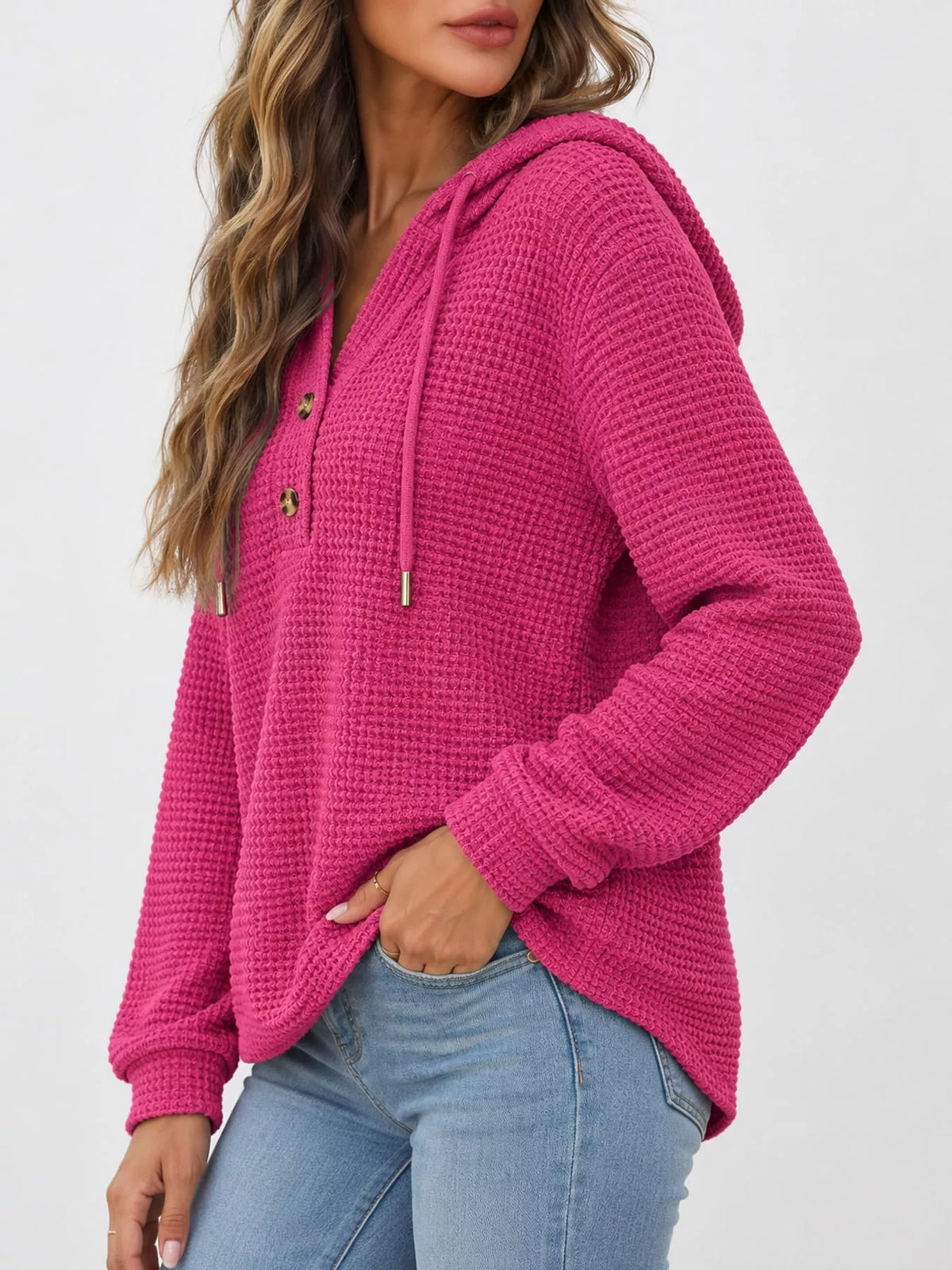 Hot pink waffle knit button-detail hoodie, side view