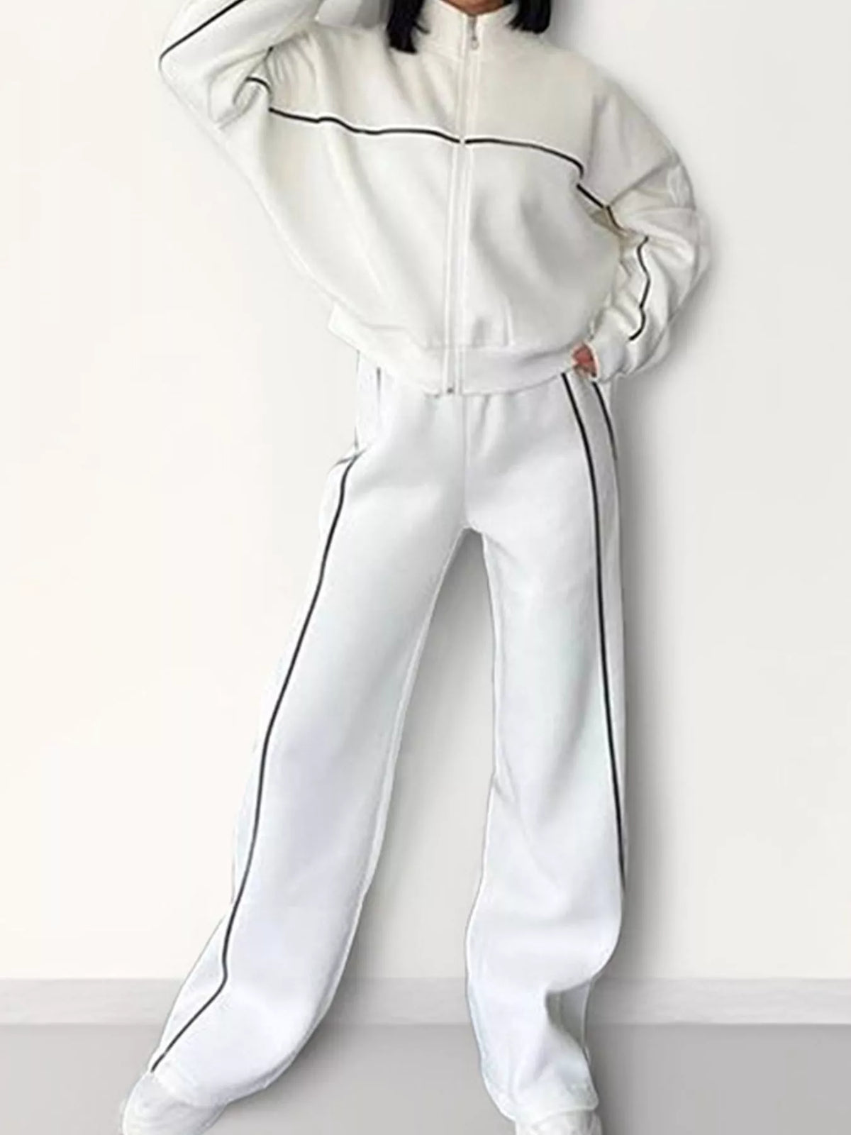 White zip-up jacket and wide-leg pants set