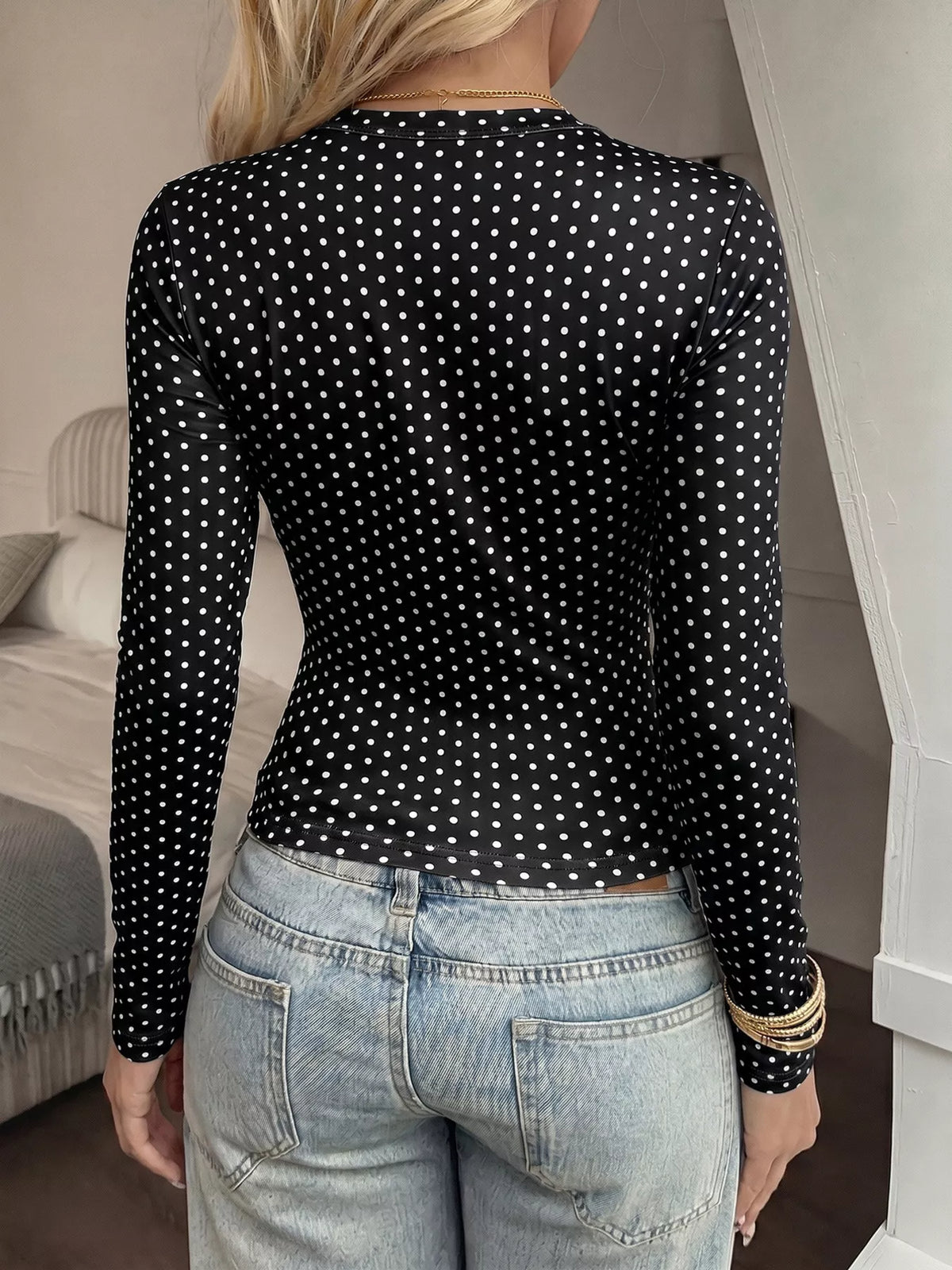 Black polka dot slim-fit long sleeve T-shirt, back view