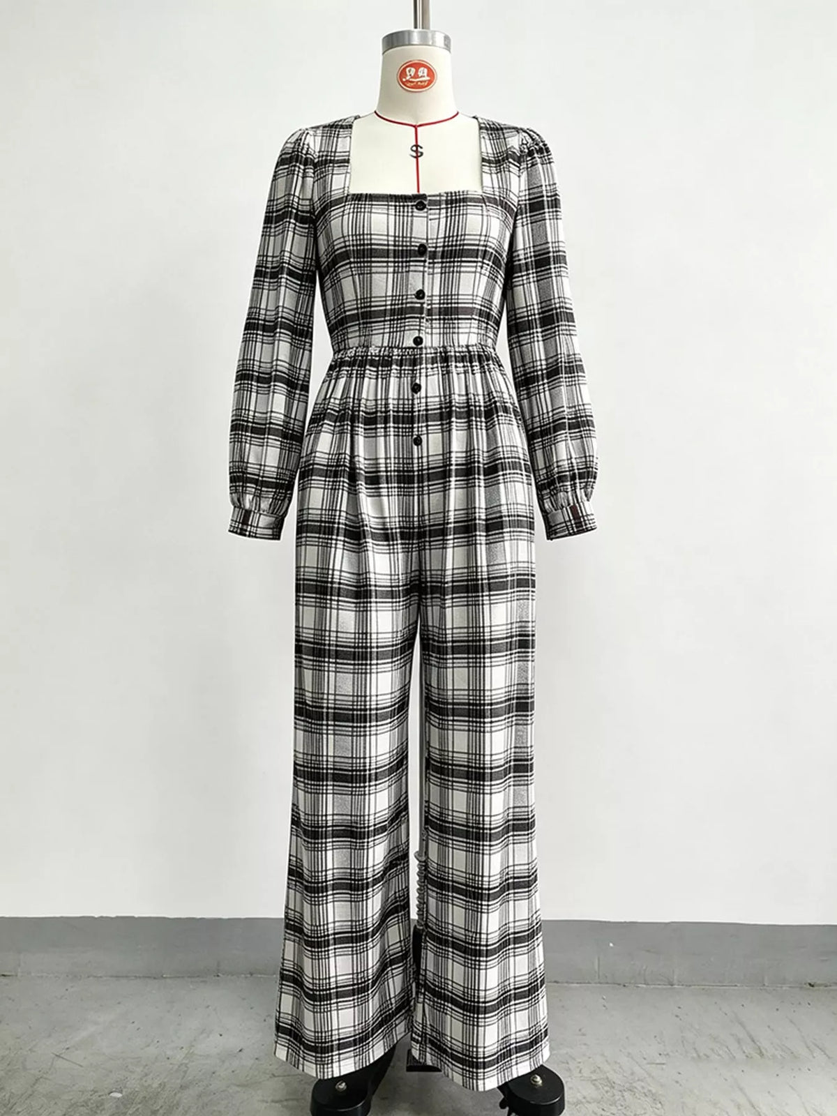 Plaid jumpsuit, black white hanging front