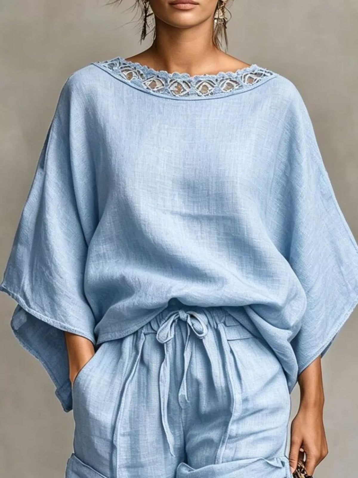 Light blue lace-trim top and drawstring shorts set, lace neckline and waist detail.