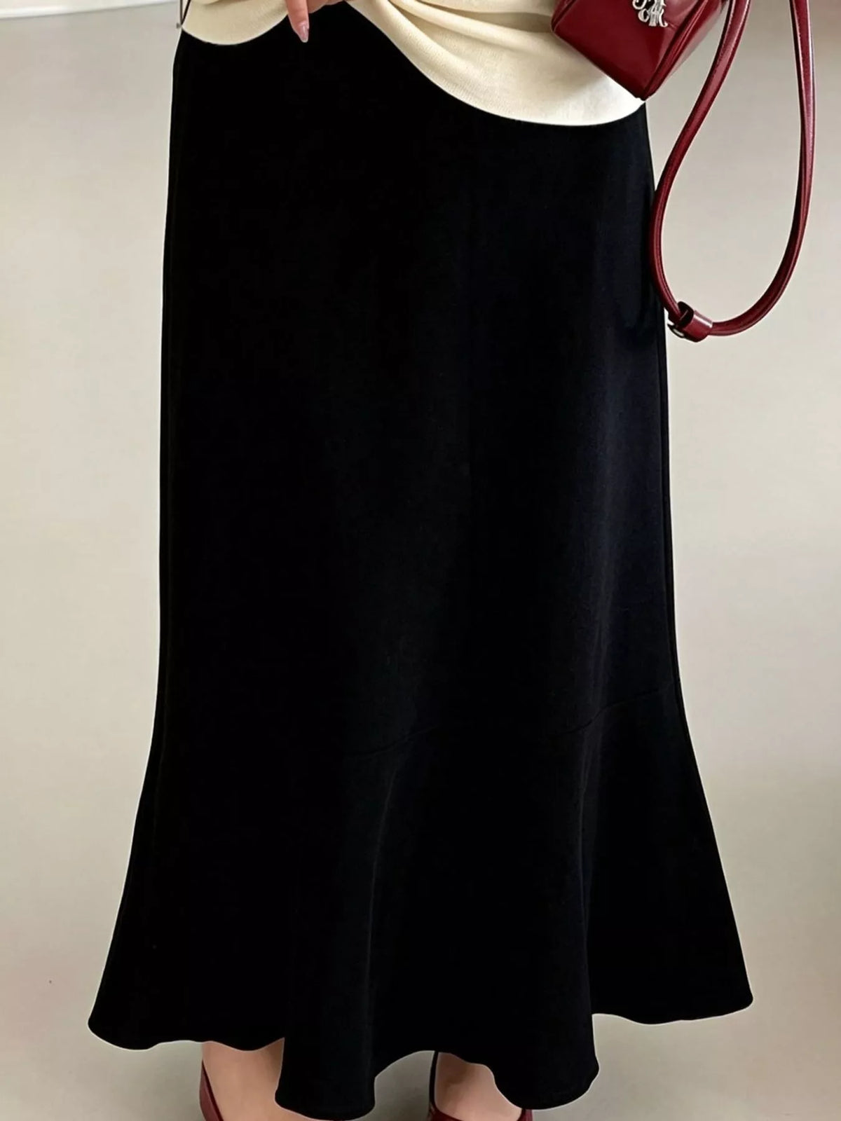 Black high-waisted flared skirt