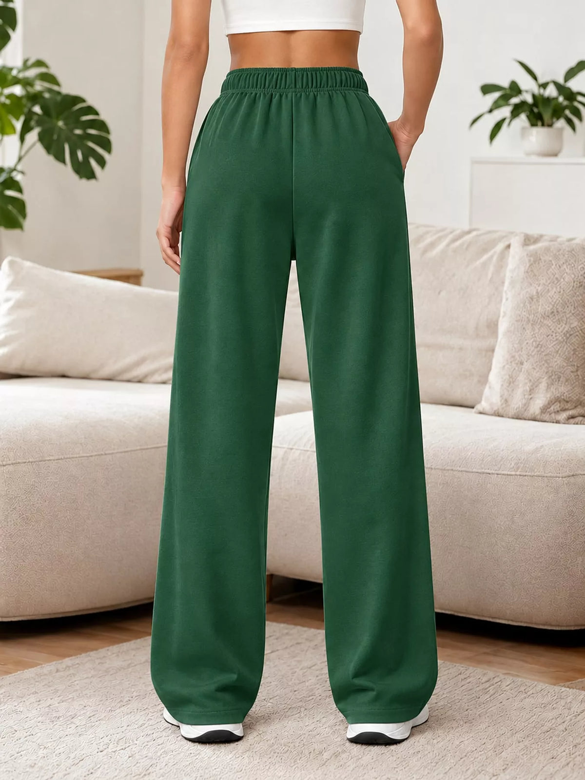 Forest green wide-leg pants with drawstring, back view