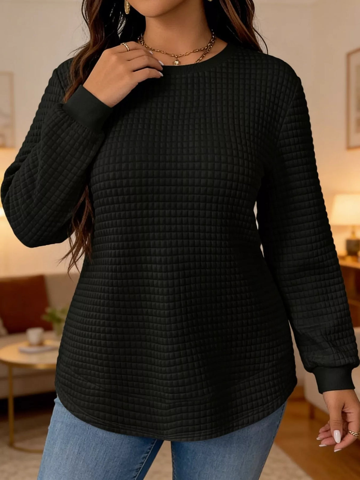 Black waffle knit sweatshirt with curved hem
