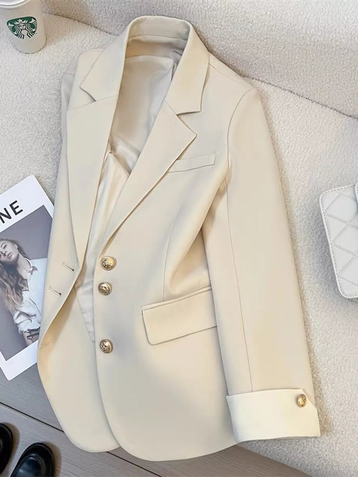 Cream single-breasted blazer with gold-tone buttons