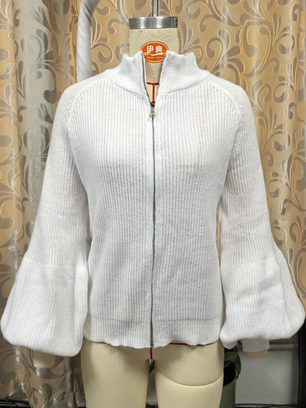 White ribbed knit zip-up lantern sleeve cardigan