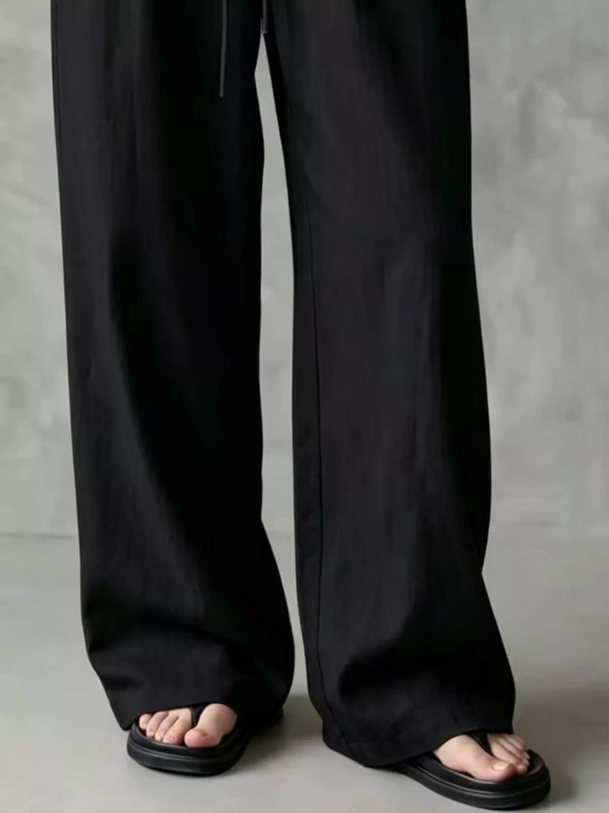 Women's Drawstring Wide-Leg Casual Pants in black — hem detail view