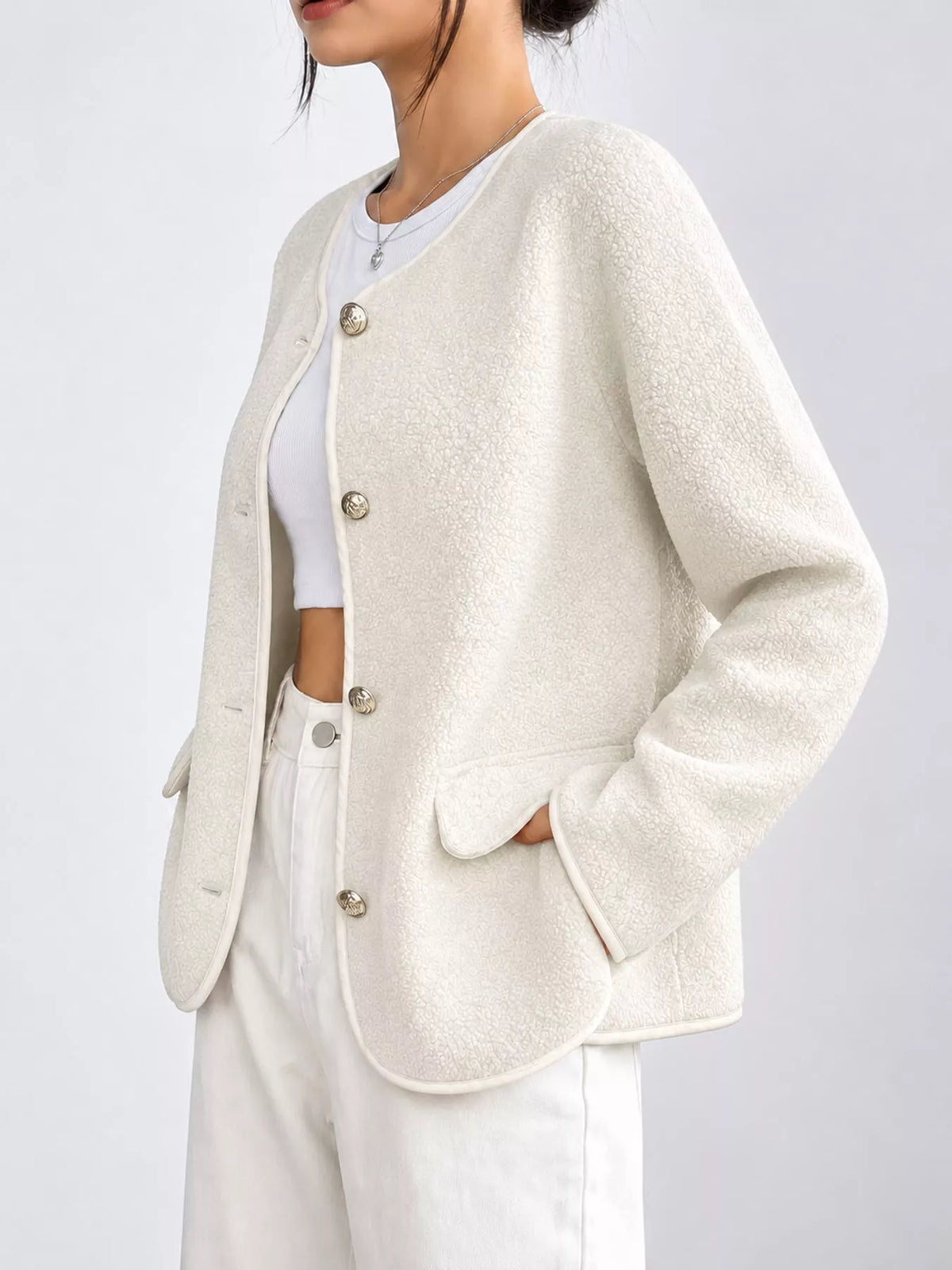 White textured button-front jacket — side view