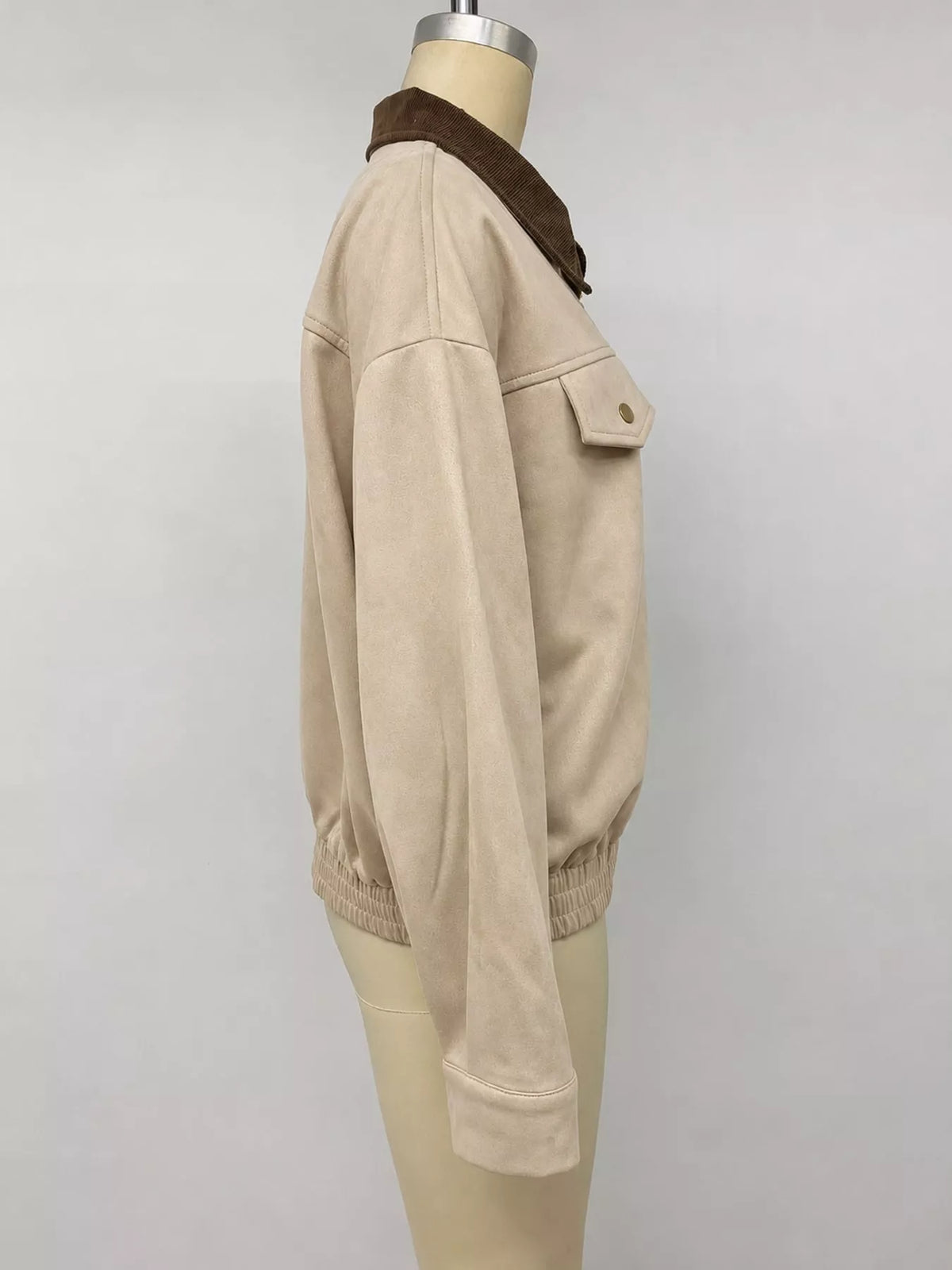 Beige zip-up dropped shoulder jacket — side view