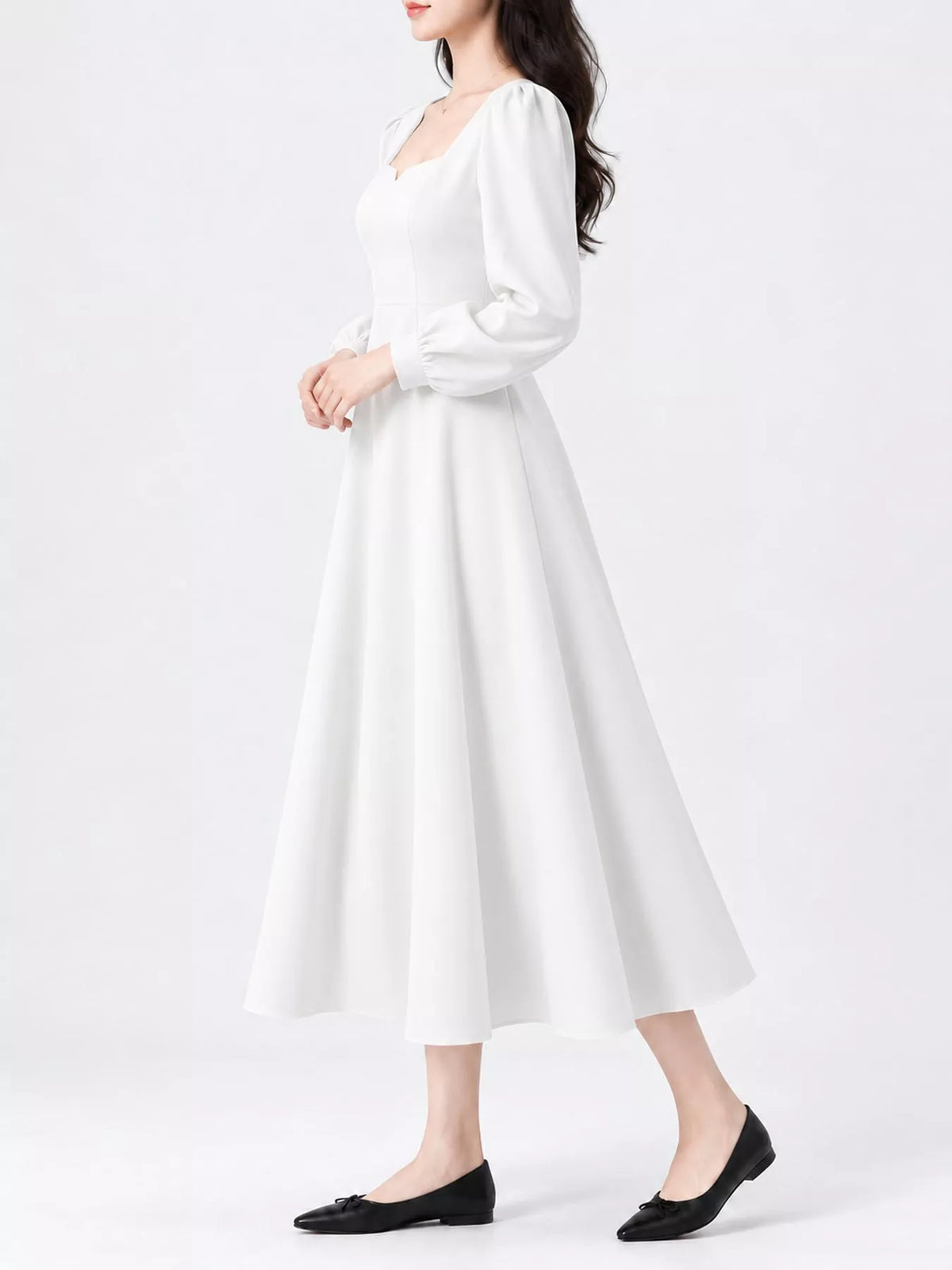 White long sleeve a line midi dress, side view