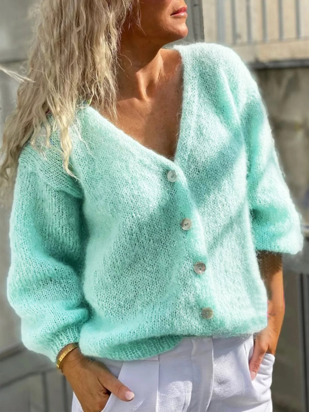 V-neck long sleeve cardigan, front view on model