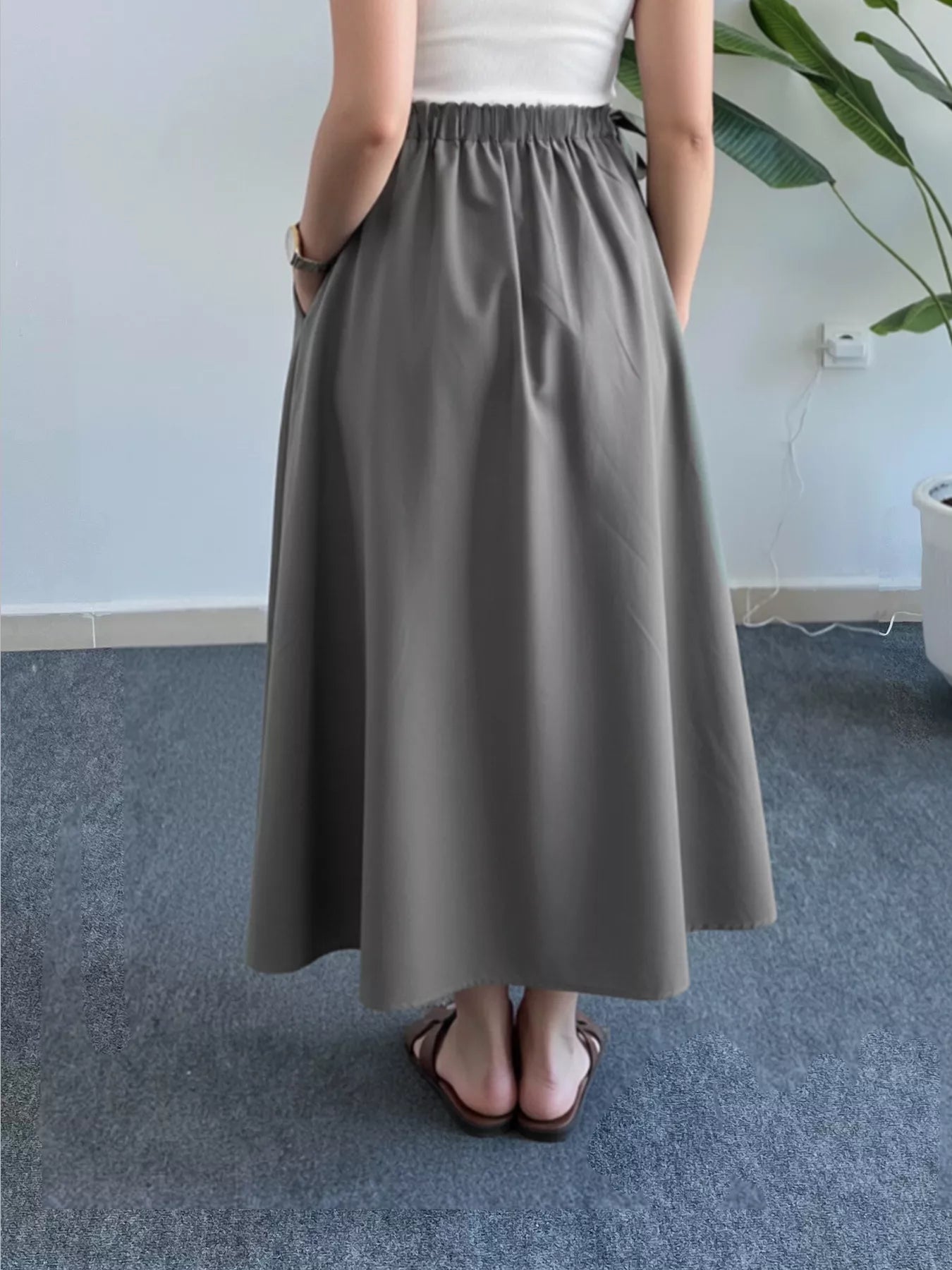 Trendsi Flowy A-Line Midi Skirt with Pockets -