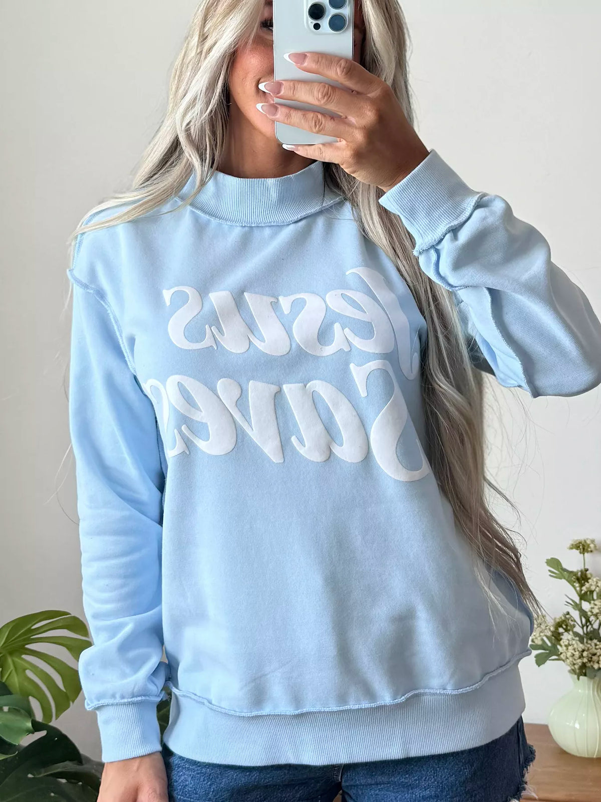 Light blue jesus saves stand neck oversized sweatshirt — front view