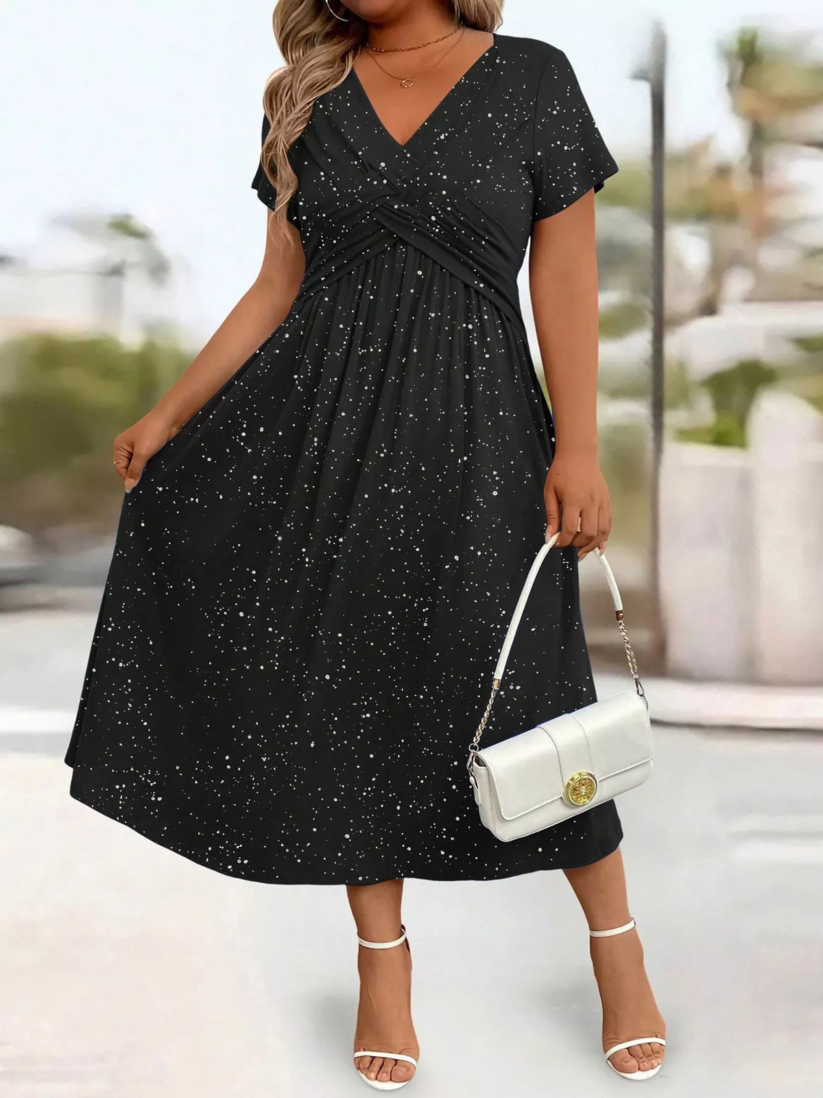 Black speckled short sleeve midi dress with pockets, flared skirt
