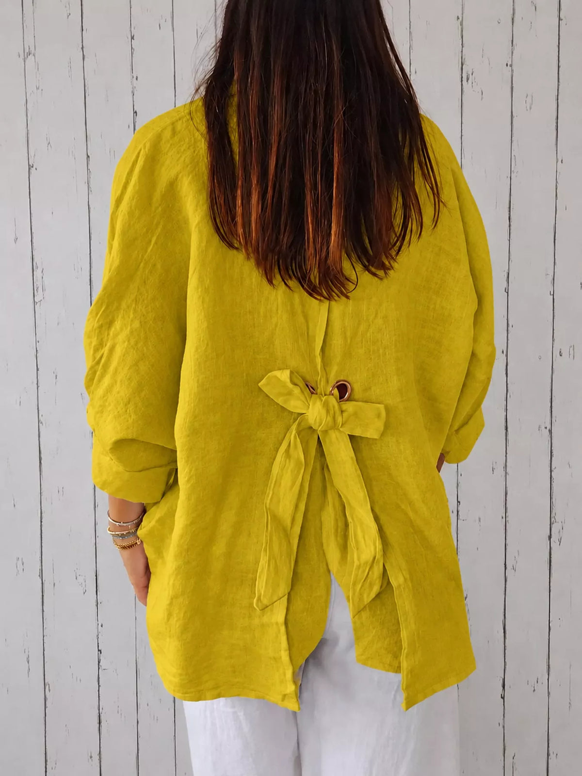 Yellow loose fit tie back shirt, back view