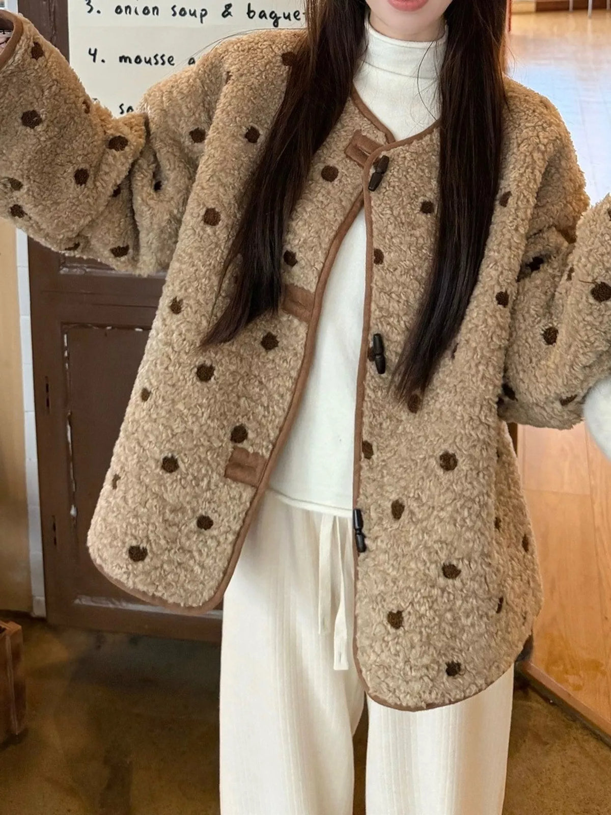 Beige with brown polka dots polka dot toggle jacket, front view