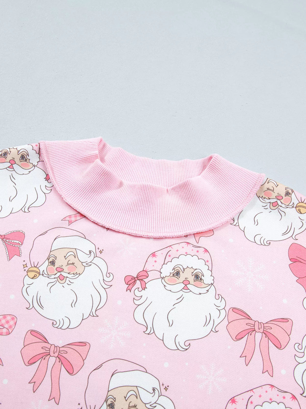 Santa-and-bow sweatshirt, mock neck front detail