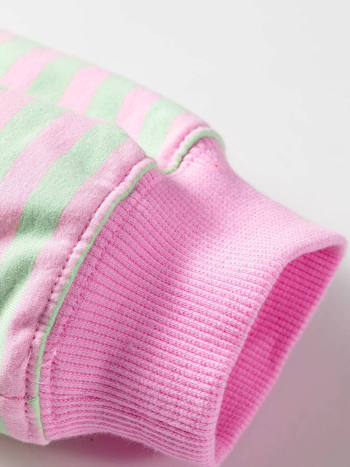 Striped Round Neck Long Sleeve Sweatshirt in pink and green, cuff detail