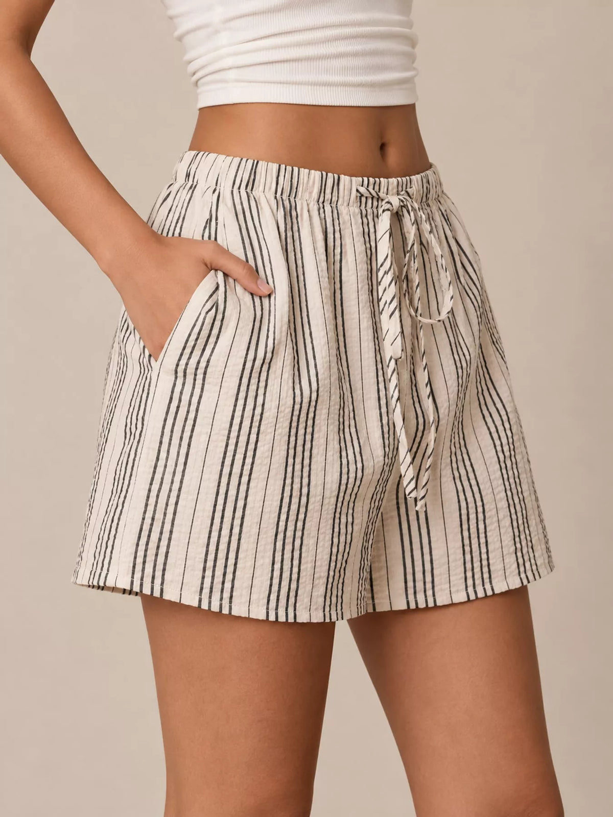 Striped skort, black striped shorts beneath overlay