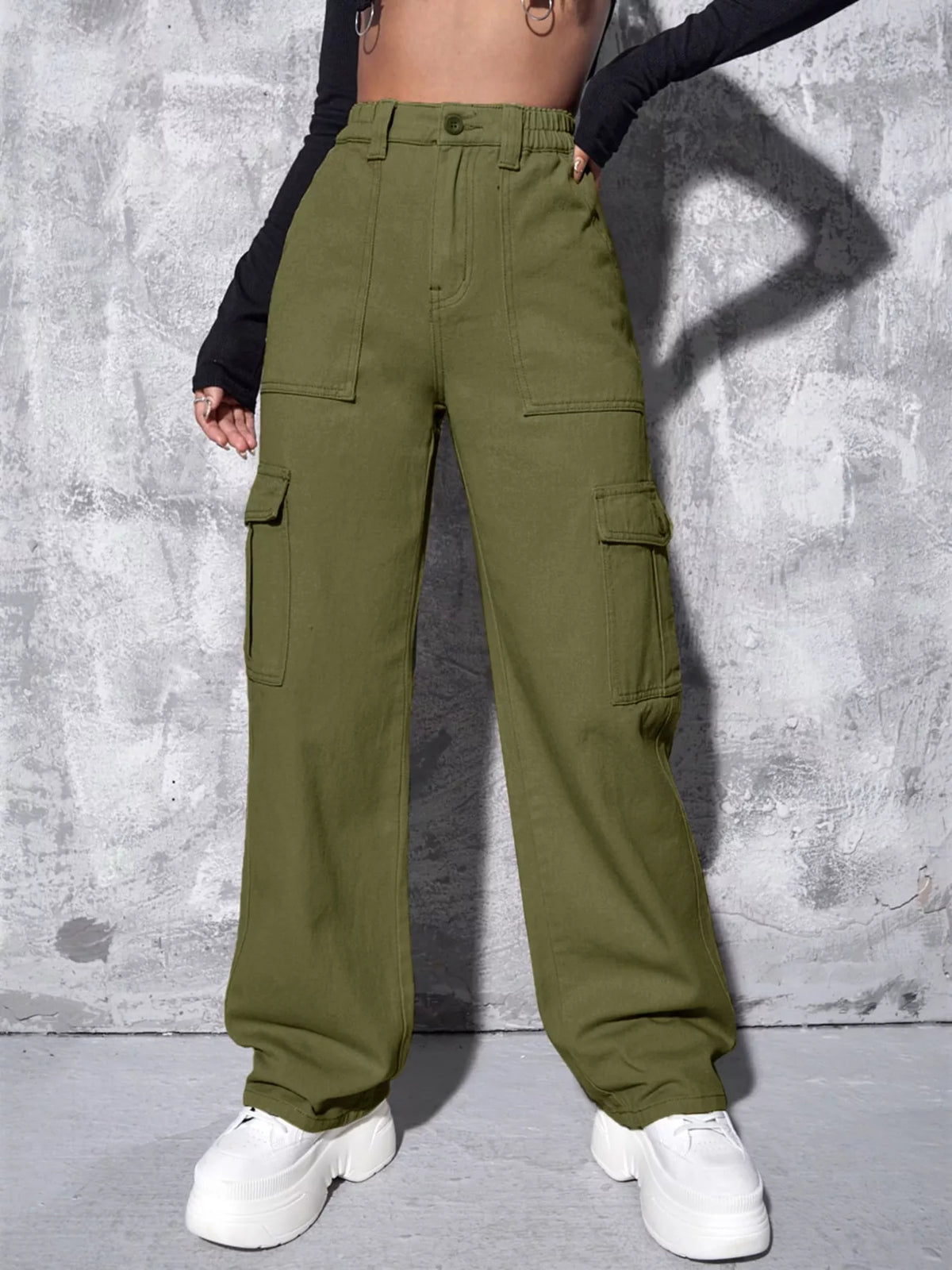 Olive green wide-leg cargo jeans, front view with hand in pocket