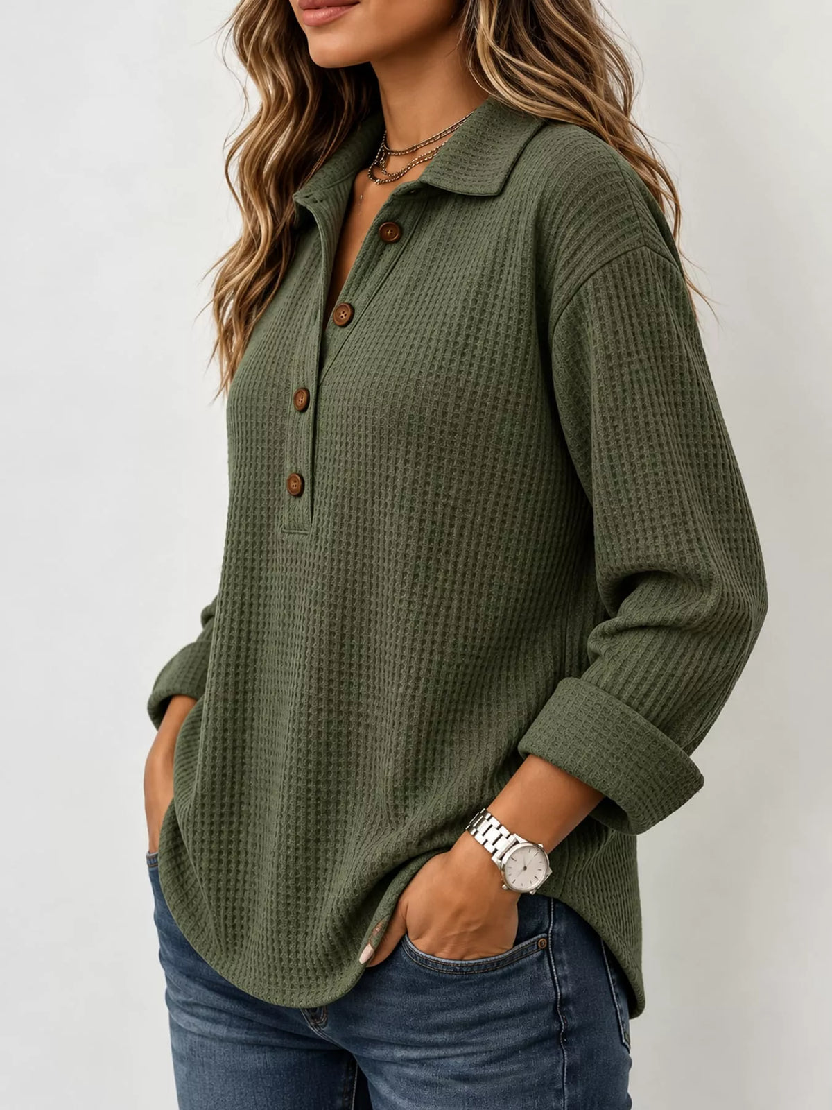 Green waffle knit long sleeve polo top, side view