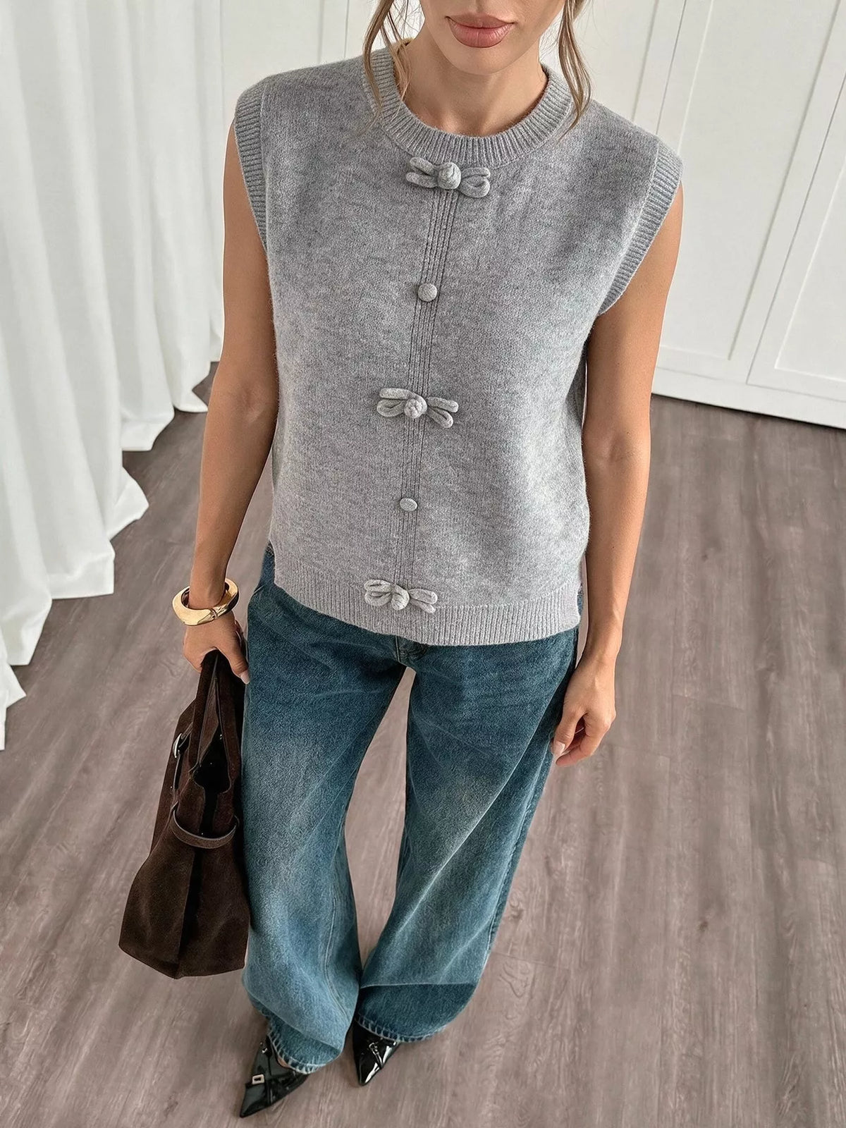 Gray bow-detail knit sweater vest, front view