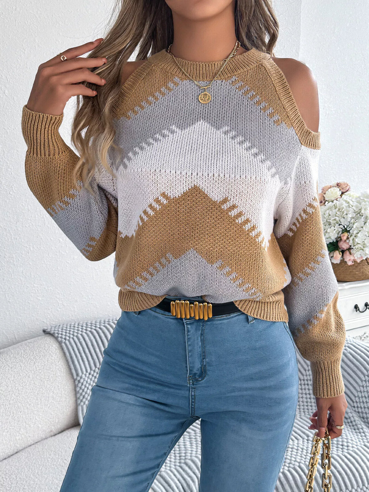Tan, white and gray cold shoulder chevron pattern knit sweater