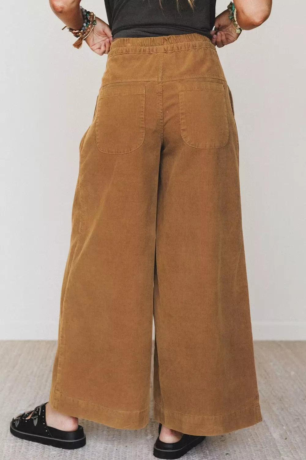 Brown button-detail wide-leg pants, back view