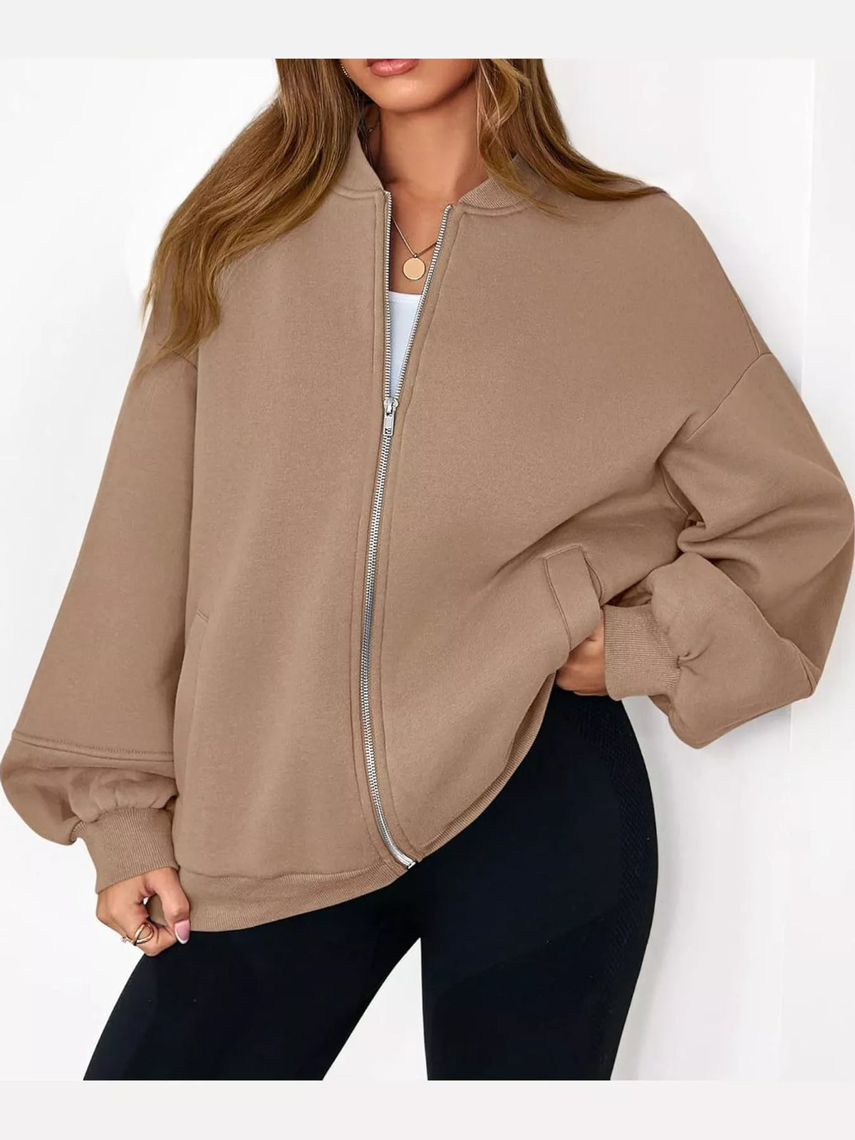 Tan oversized zip-up jacket — front view