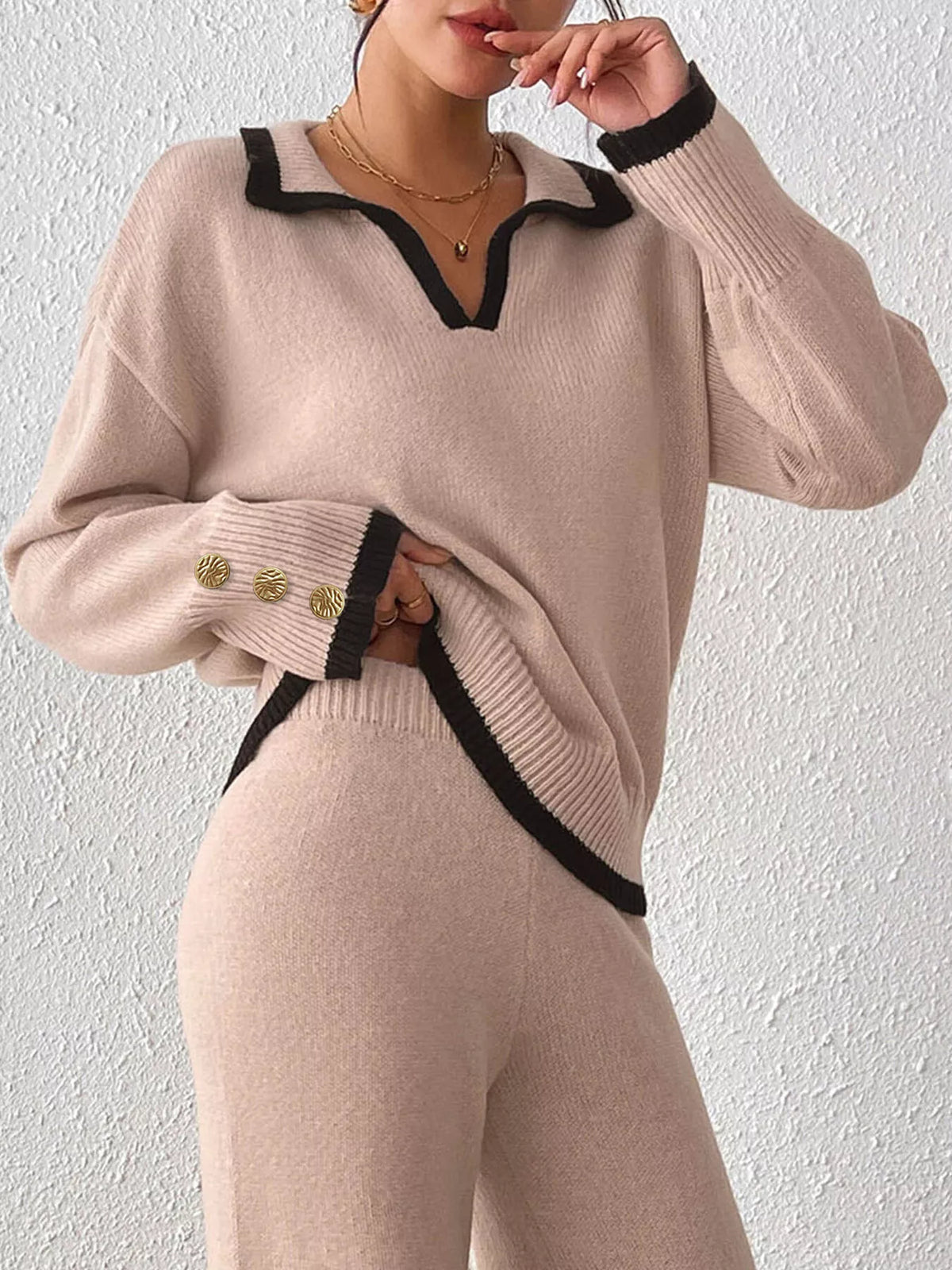 Pink contrast-trim polo collar sweater, button cuff view