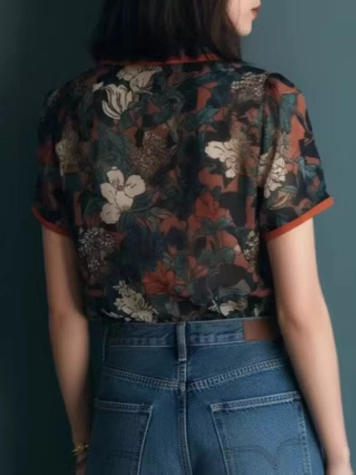Red vintage floral print v-neck blouse with contrast trim, back view