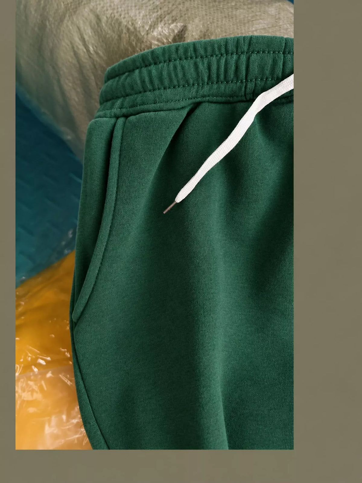 Forest green wide-leg pants with drawstring, detail view