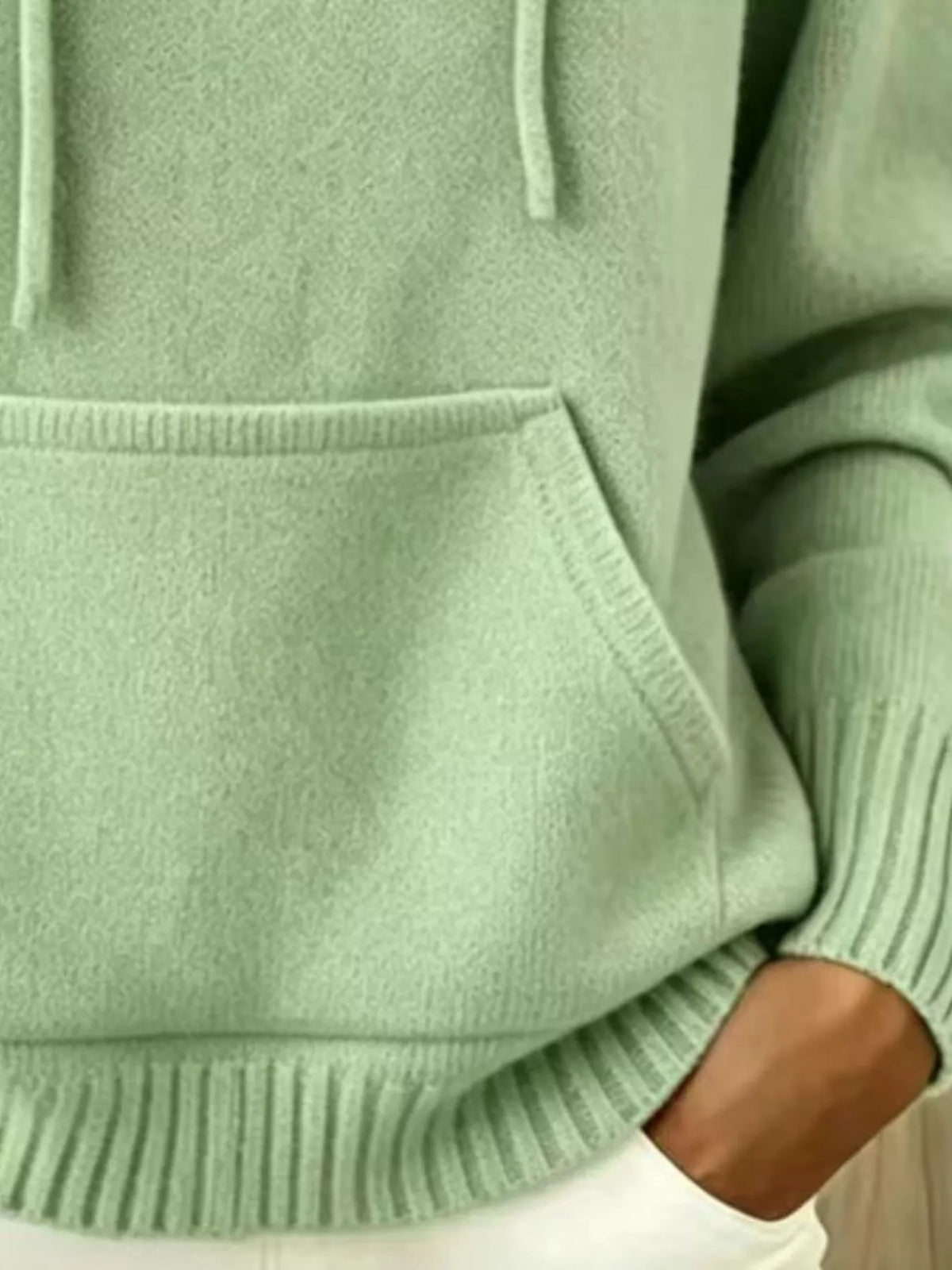 Women's Drawstring Kangaroo Pocket Hooded Sweater in sage — pocket detail view