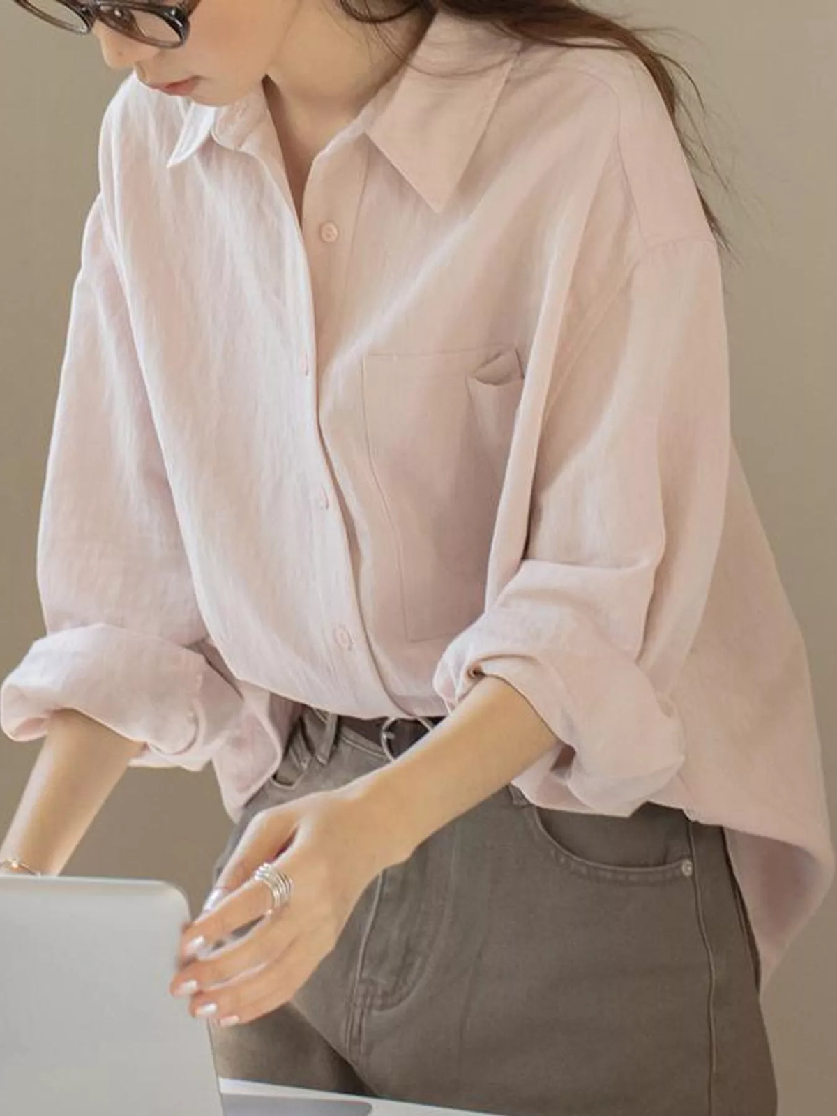 Pink button down long sleeve shirt, front view