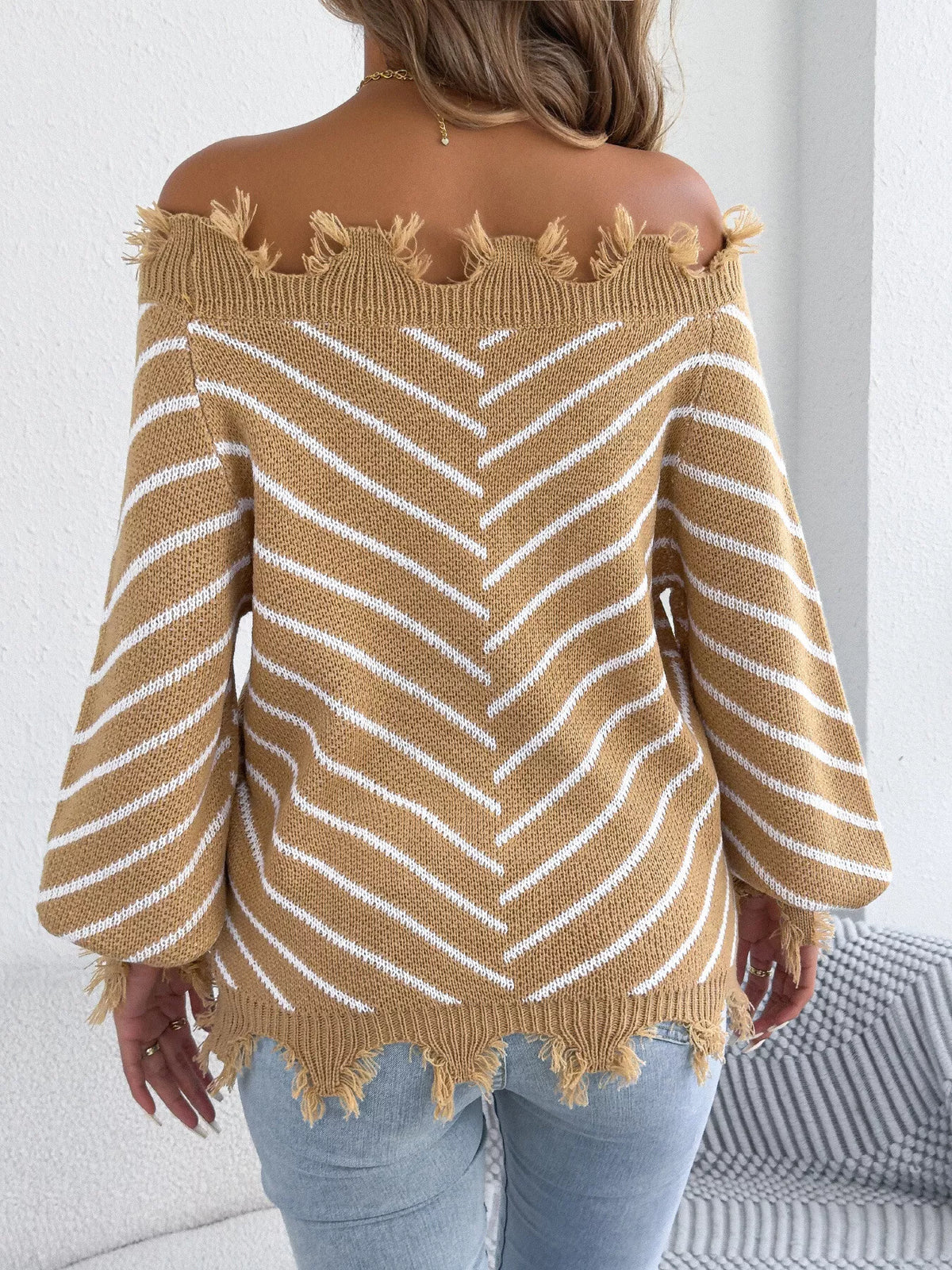 Khaki off-shoulder distressed striped sweater, back view