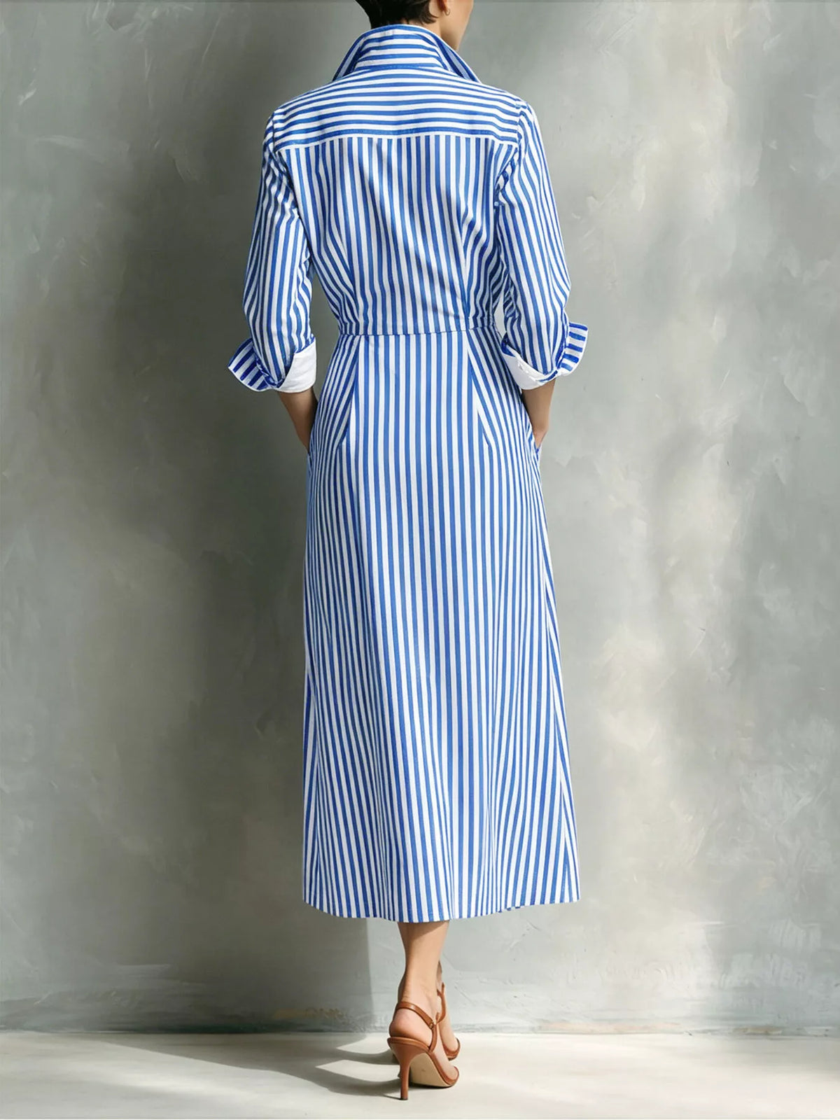 Blue and white striped shirt dress with contrast pocket, back view