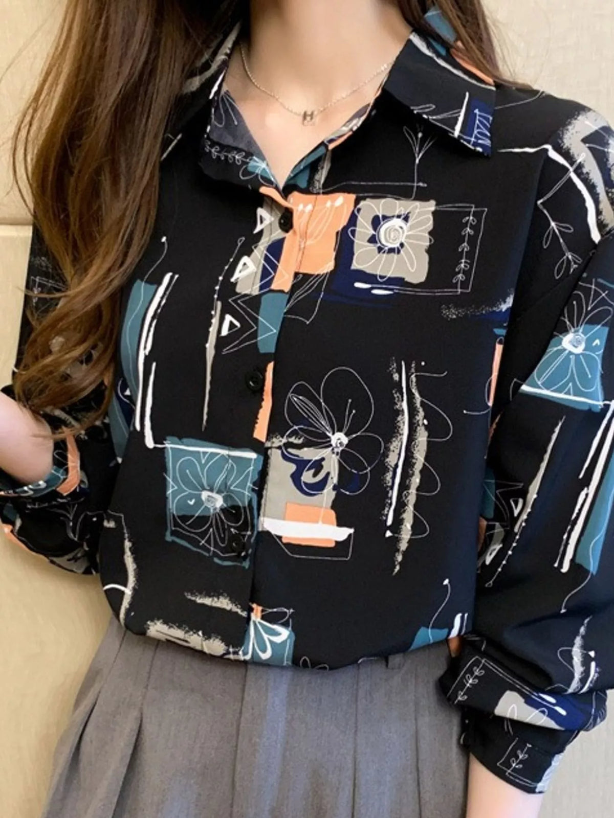 Printed Long Sleeve Button-Down Shirt in black with multicolor print