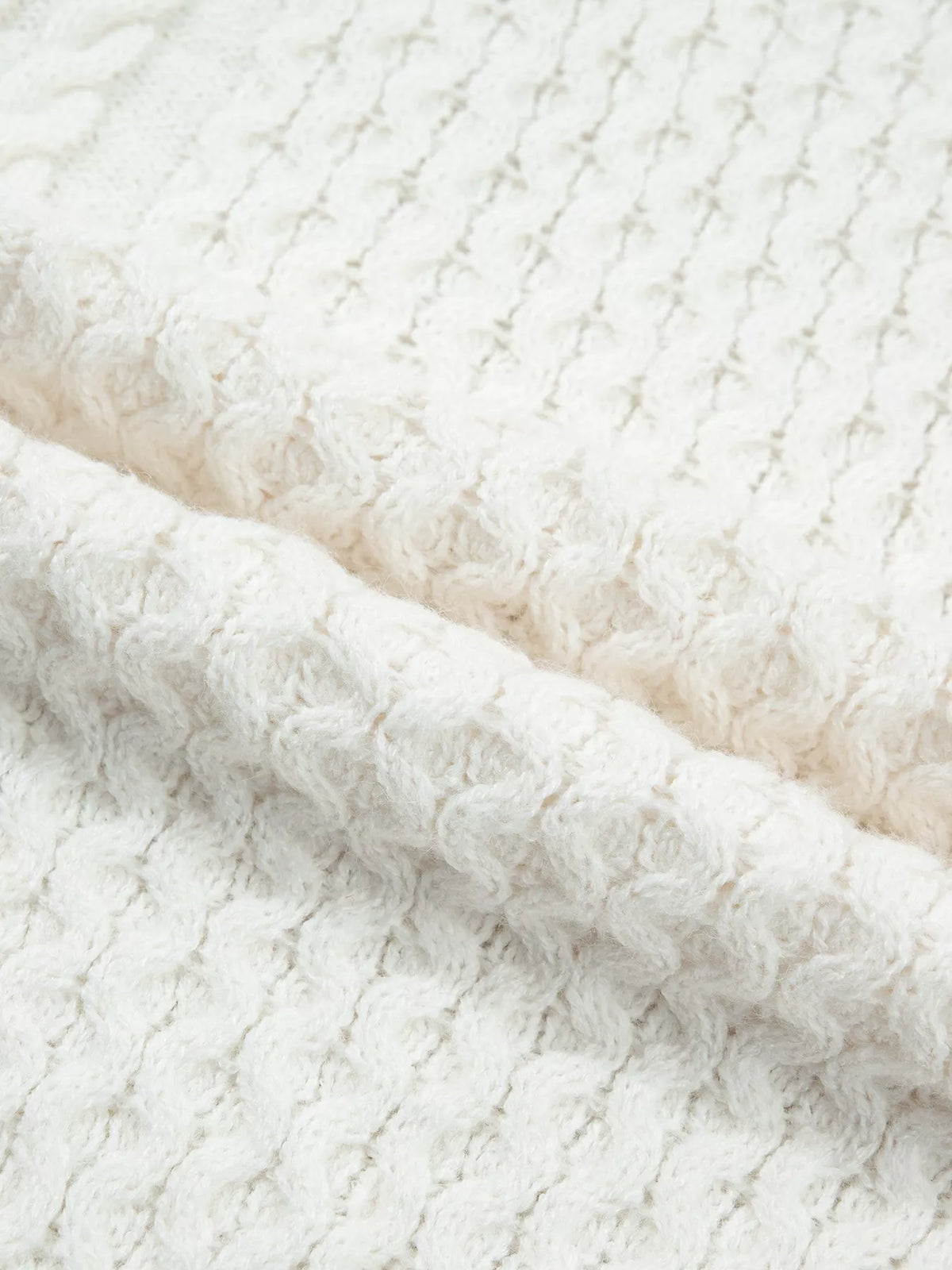 Cable Round Neck Sweater in white, construction detail