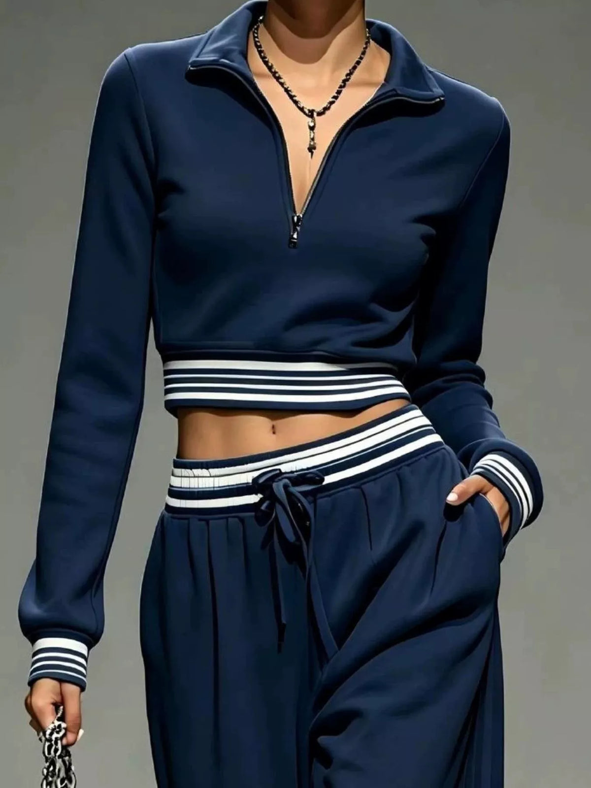 Navy half-zip crop top and pants set, zip neckline and waist detail