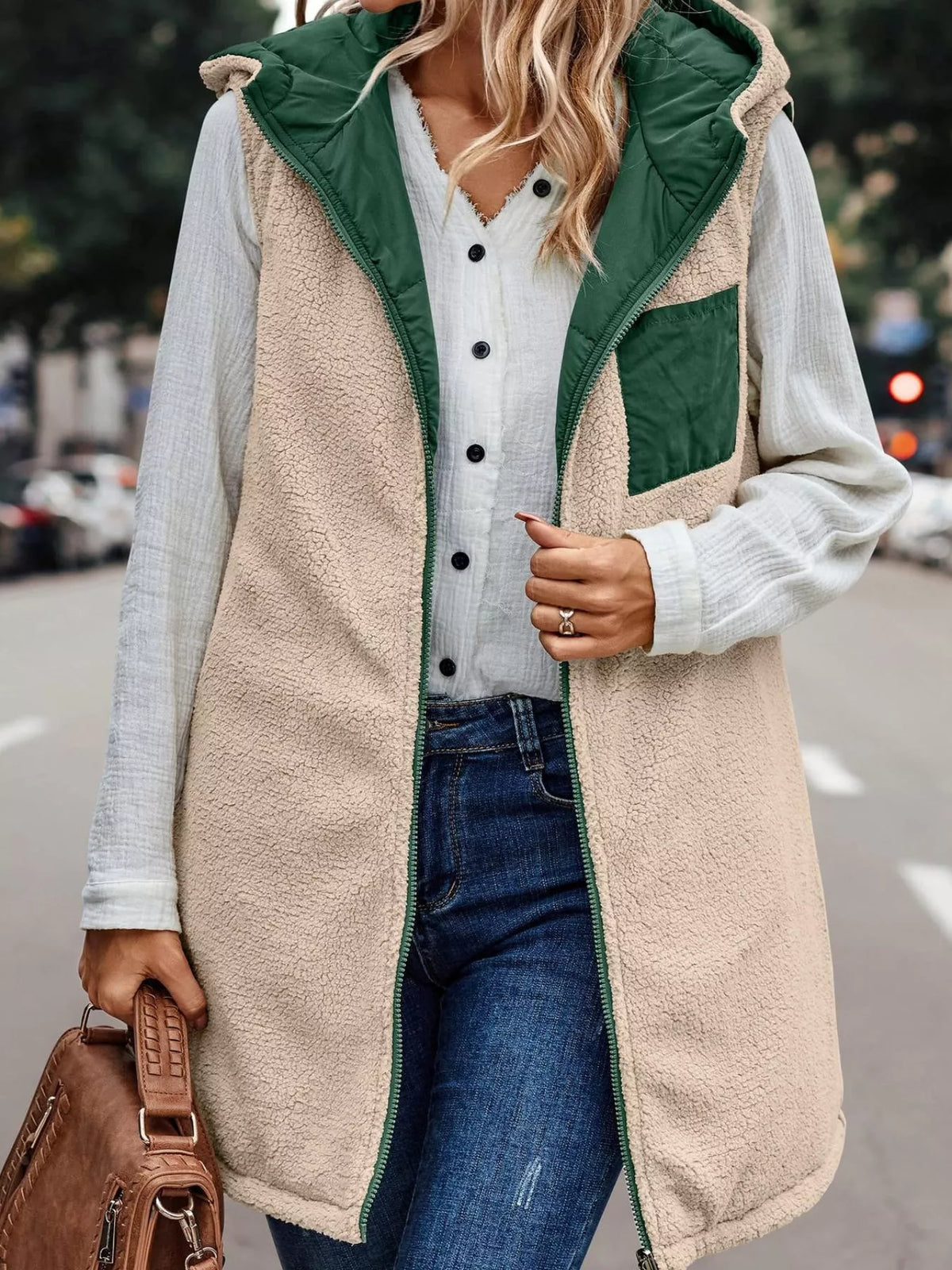 Green hooded sherpa-lined puffer vest, sherpa reverse view