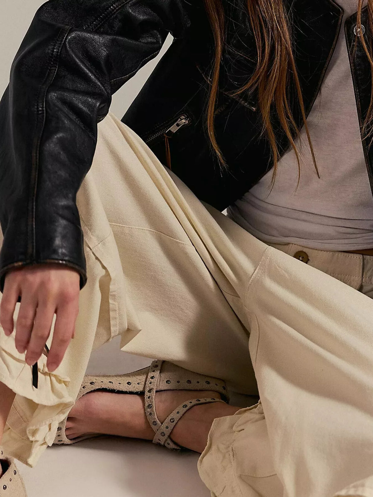 Cream wide-leg ruffle-hem jeans