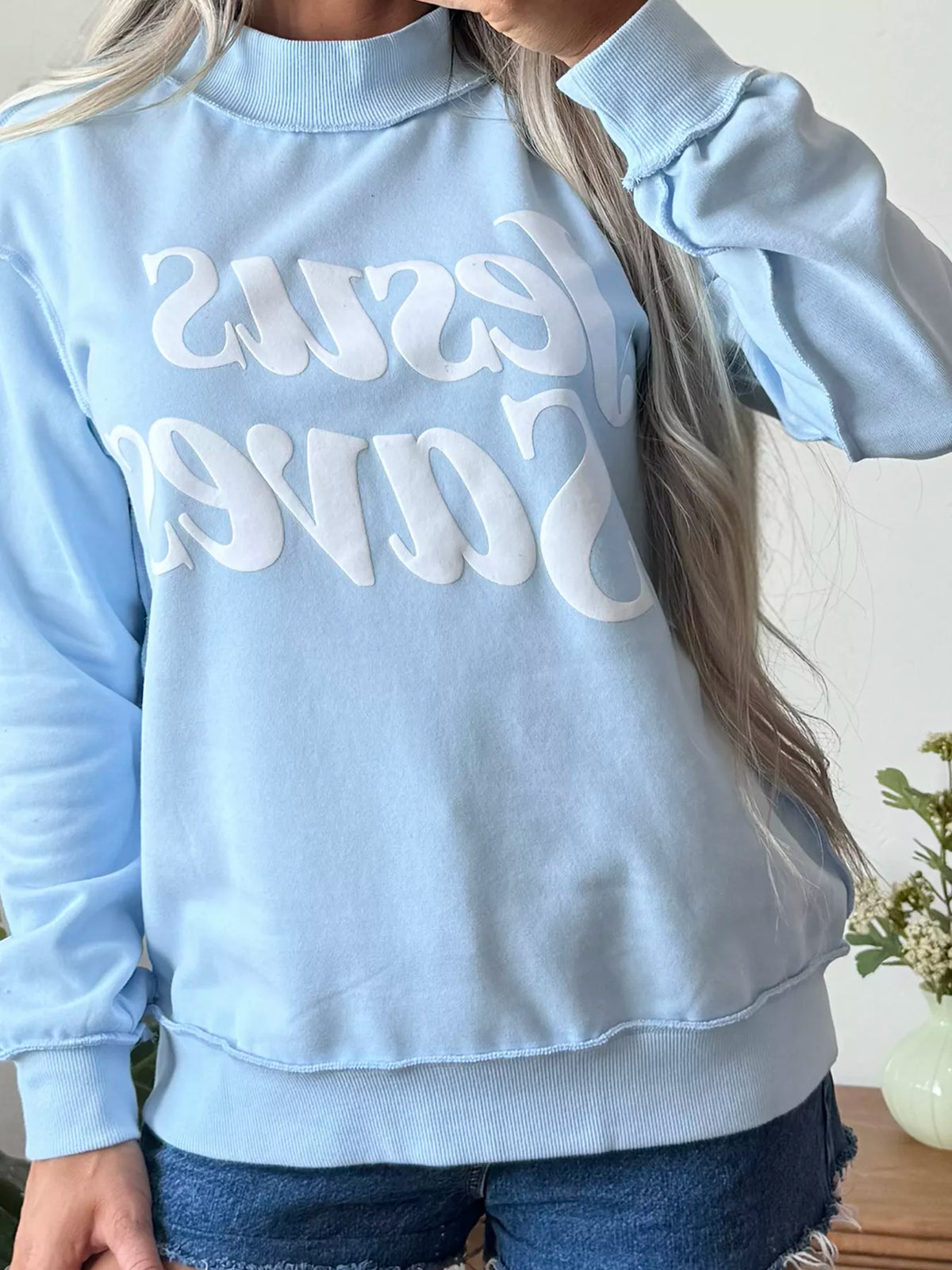 Light blue jesus saves stand neck oversized sweatshirt — design and construction details